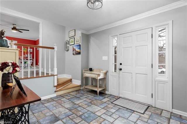 entryway featuring crown molding and ceiling fan