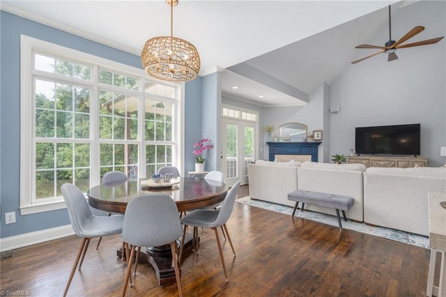 612 Wigeon Dr, Greensboro, NC 27455 - dining area featuring healthy amount of natural light, dark wood-type flooring, crown molding, high vaulted ceiling, and recessed lighting