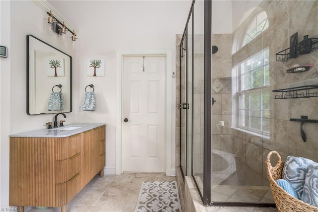 612 Wigeon Dr, Greensboro, NC 27455 - bathroom featuring a stall shower and vanity
