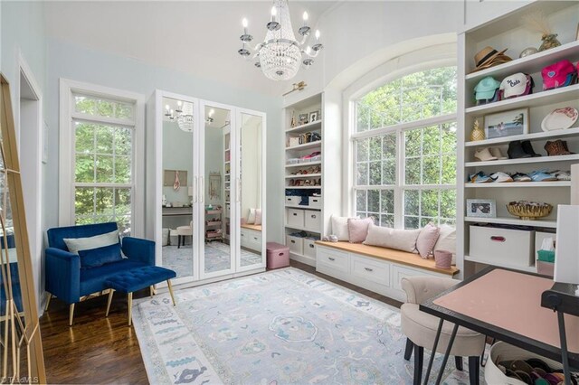 612 Wigeon Dr, Greensboro, NC 27455 - mudroom with a chandelier, wood finished floors, built in shelves, and french doors