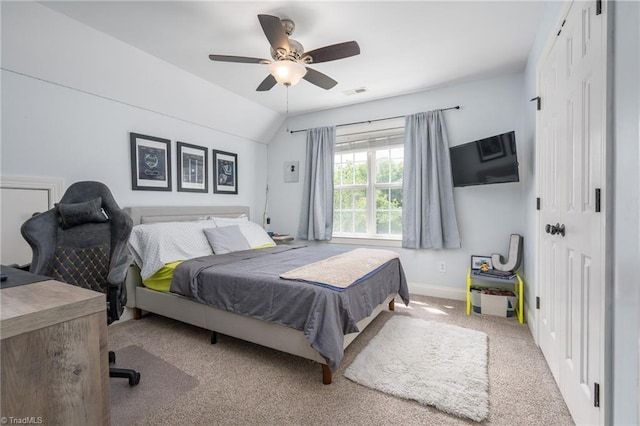 612 Wigeon Dr, Greensboro, NC 27455 - bedroom featuring baseboards, carpet flooring, lofted ceiling, ceiling fan, and a closet