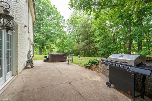612 Wigeon Dr, Greensboro, NC 27455 - view of patio with a hot tub and area for grilling