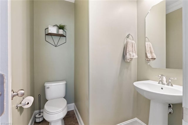 4 Harvest Oak Ct, Greensboro, NC 27406 - bathroom with toilet and baseboards