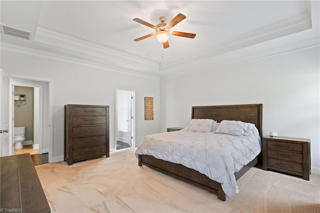 4 Harvest Oak Ct, Greensboro, NC 27406 - bedroom with a raised ceiling, ornamental molding, carpet floors, connected bathroom, and ceiling fan