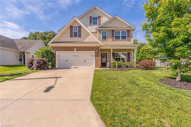 4 Harvest Oak Ct, Greensboro, NC 27406 - craftsman inspired home with concrete driveway, brick siding, board and batten siding, a front lawn, and a garage