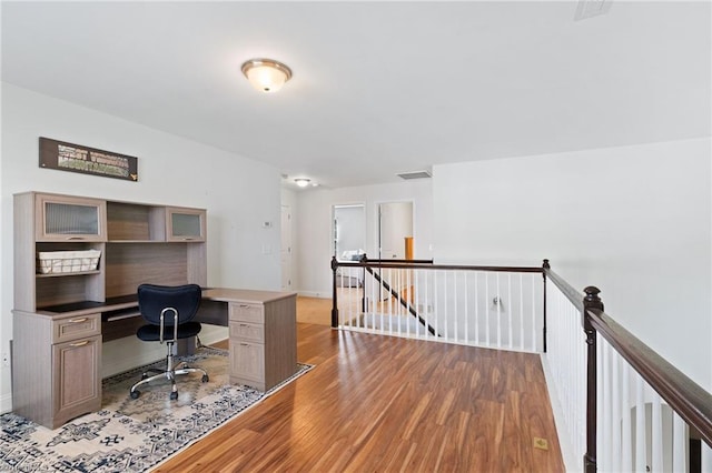 4 Harvest Oak Ct, Greensboro, NC 27406 - office area with wood finished floors, built in study area, and baseboards
