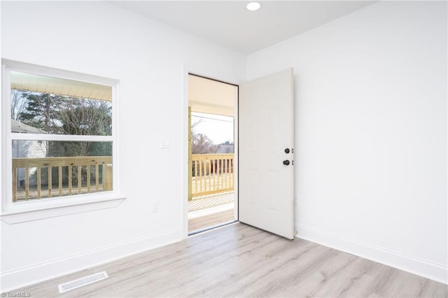 interior space featuring a wealth of natural light and light wood-type flooring