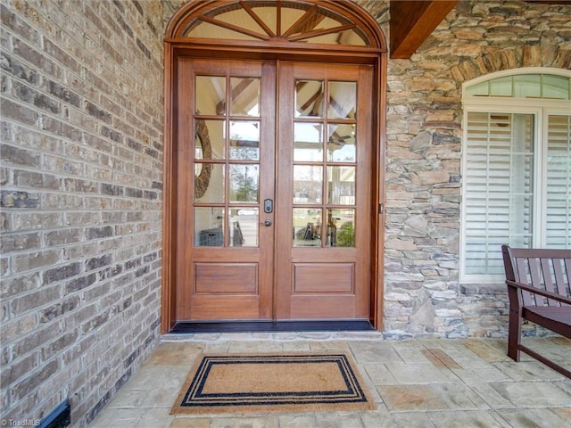 entrance to property featuring french doors