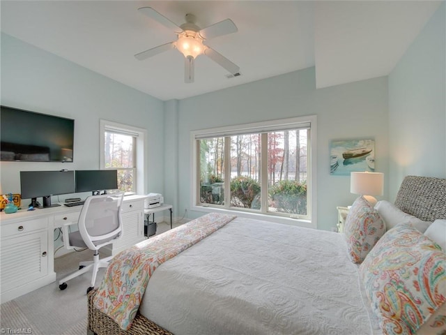 carpeted bedroom featuring ceiling fan