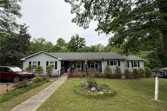 2800 Loch Dr, Winston-Salem, NC 27106 - ranch-style house with covered porch and a front yard