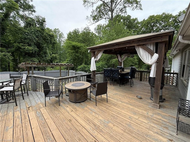 2800 Loch Dr, Winston-Salem, NC 27106 - deck featuring outdoor dining area, a gazebo, and an outdoor fire pit