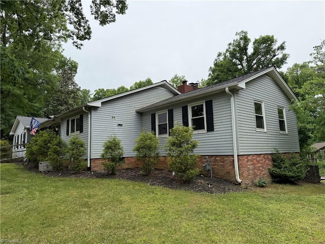 2800 Loch Dr, Winston-Salem, NC 27106 - view of property exterior featuring a chimney and a lawn