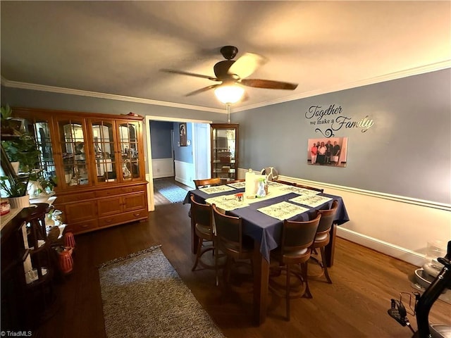 2800 Loch Dr, Winston-Salem, NC 27106 - dining area with ceiling fan, dark wood-style flooring, crown molding, and baseboards
