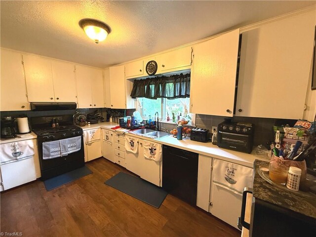 2800 Loch Dr, Winston-Salem, NC 27106 - kitchen featuring black appliances, light countertops, a sink, dark wood-style floors, and backsplash