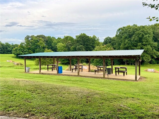 view of home's community with a yard and a gazebo