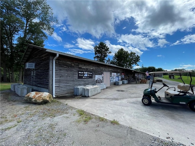 view of home's exterior with a carport