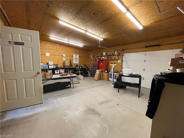 garage with a workshop area