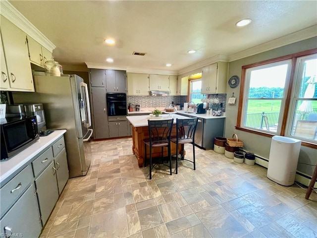 kitchen featuring gray cabinetry, light tile patterned floors, black appliances, and tasteful backsplash