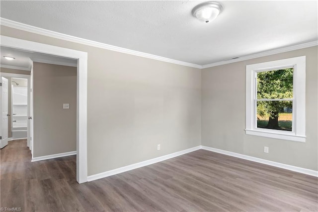 unfurnished room with crown molding and dark hardwood / wood-style flooring