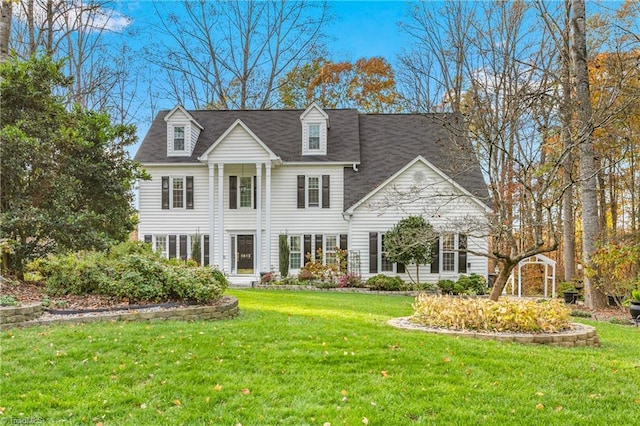 view of front of property with a front lawn