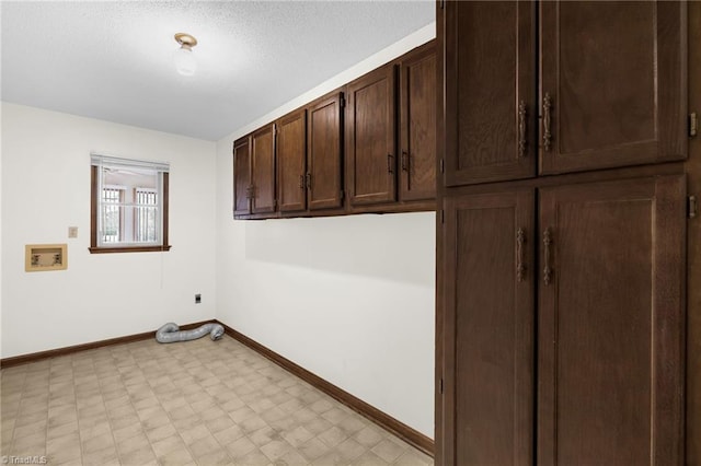 laundry room with cabinets, washer hookup, and hookup for an electric dryer