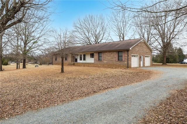 ranch-style home with a garage