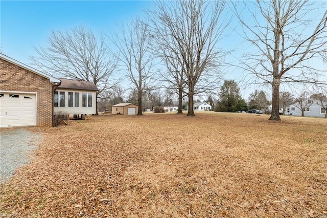 view of yard with a garage