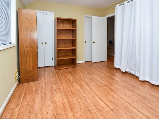 4610 Woodsman Way, Winston-Salem, NC 27103 - unfurnished bedroom featuring wood finished floors
