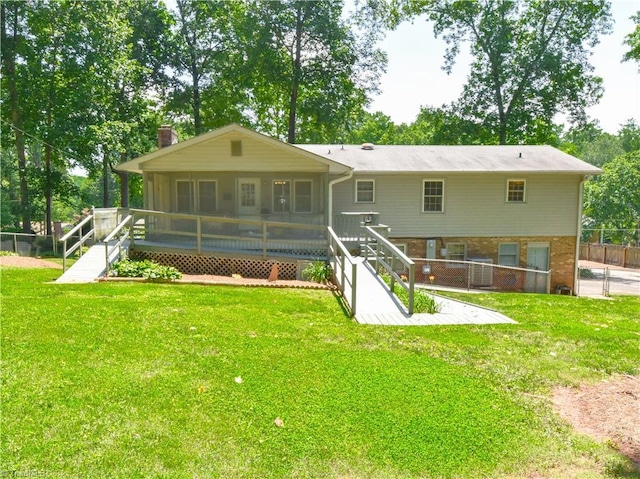 4610 Woodsman Way, Winston-Salem, NC 27103 - back of property with a sunroom, a patio area, and a chimney