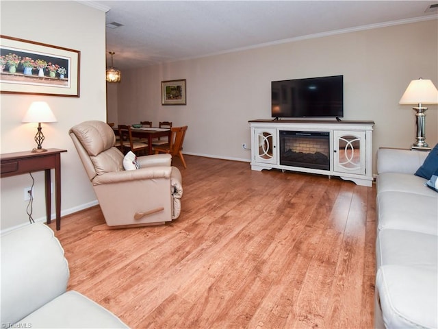 4610 Woodsman Way, Winston-Salem, NC 27103 - living room featuring wood finished floors and crown molding