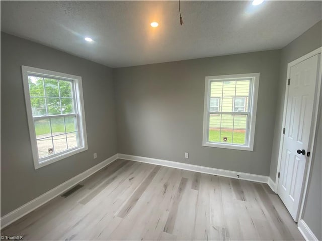 7 Crutchfield Ave, Lexington, NC 28445 - spare room with light wood finished floors, baseboards, and recessed lighting