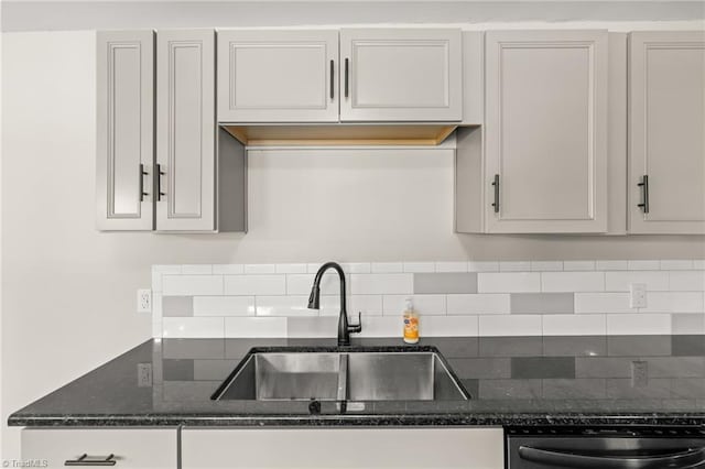 212 Lakeview Dr E, Thomasville, NC 27360 - kitchen with dishwasher, tasteful backsplash, and dark stone counters