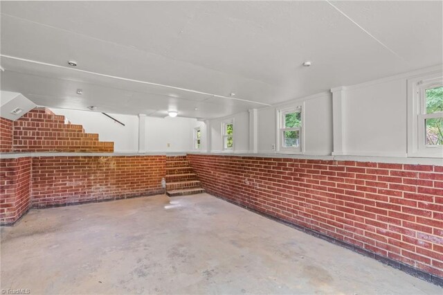 212 Lakeview Dr E, Thomasville, NC 27360 - basement with brick wall and stairs