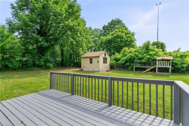 212 Lakeview Dr E, Thomasville, NC 27360 - deck featuring a playground and a storage unit