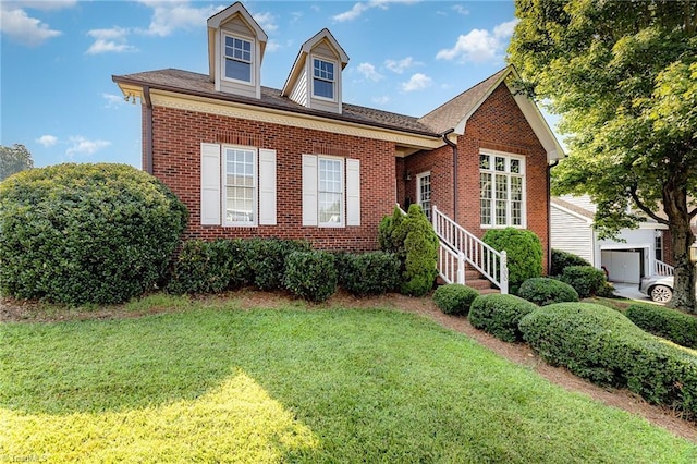 2000 Williamsburg Manor Ct, Winston-Salem, NC 27103 - view of front of home featuring a front lawn and brick siding