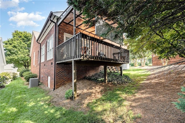 2000 Williamsburg Manor Ct, Winston-Salem, NC 27103 - view of home's exterior with brick siding, a deck, and a yard