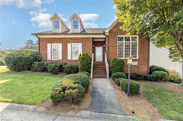 2000 Williamsburg Manor Ct, Winston-Salem, NC 27103 - view of front facade with brick siding and a front yard