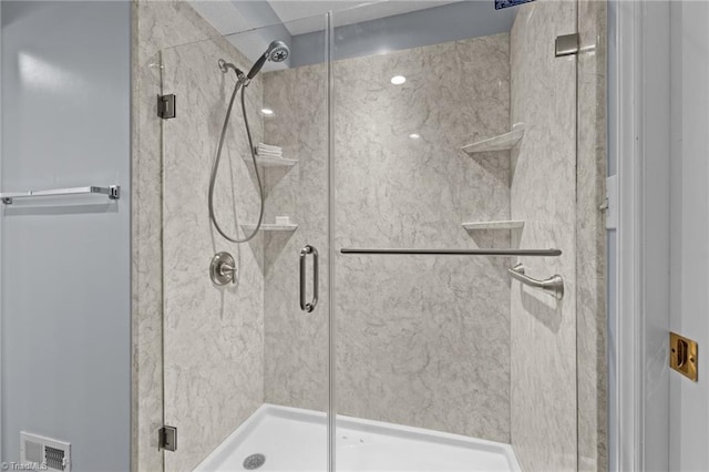 bathroom with an enclosed shower