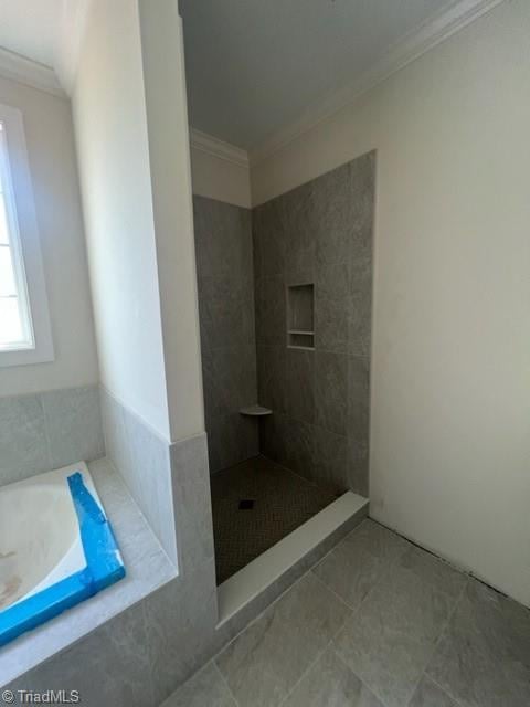 184 Providence Trl, Madison, NC 27025 - bathroom featuring crown molding, tile patterned flooring, a tile shower, and a bath