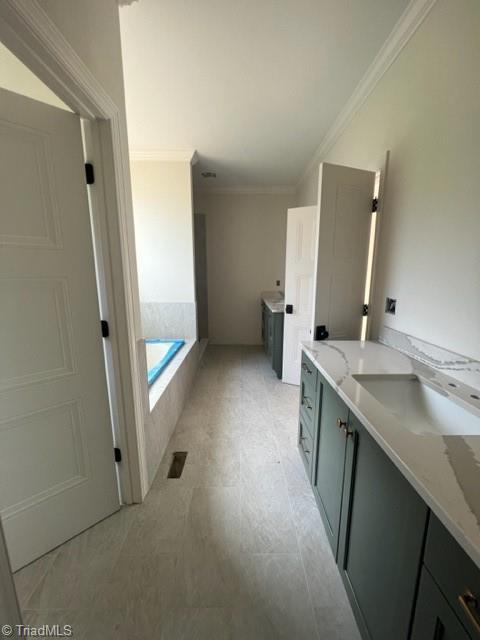 184 Providence Trl, Madison, NC 27025 - bathroom with crown molding, a bath, and vanity