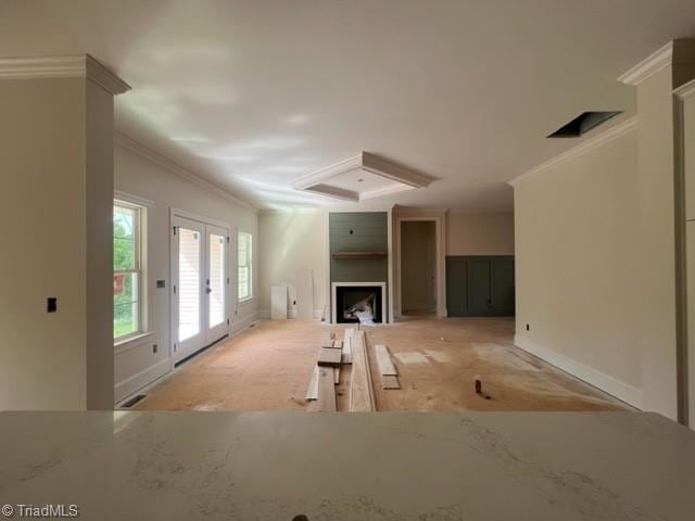 184 Providence Trl, Madison, NC 27025 - unfurnished living room with french doors, ornamental molding, and baseboards