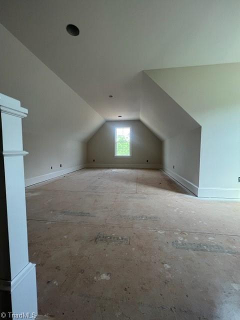 184 Providence Trl, Madison, NC 27025 - additional living space featuring baseboards and lofted ceiling