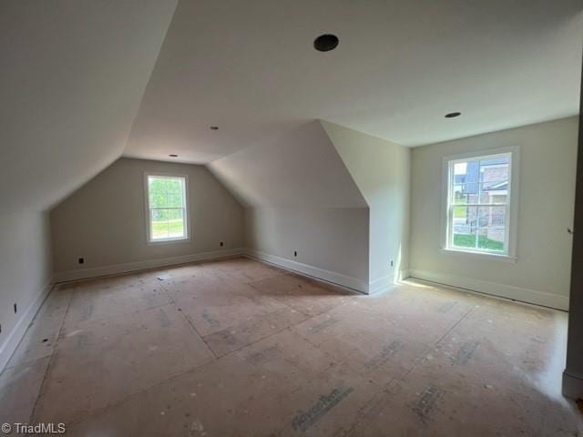 184 Providence Trl, Madison, NC 27025 - additional living space featuring baseboards and vaulted ceiling