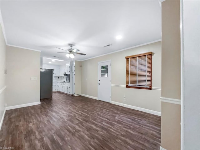 unfurnished living room featuring ceiling fan, dark hardwood / wood-style floors, and ornamental molding