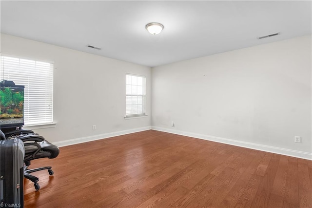 office featuring hardwood / wood-style floors