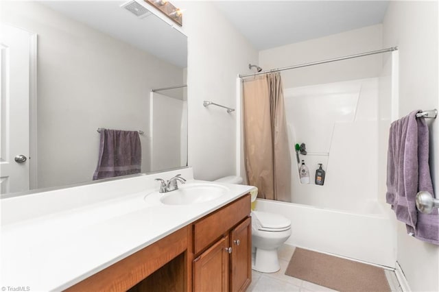 full bathroom with vanity, tile patterned floors, toilet, and shower / bath combo with shower curtain