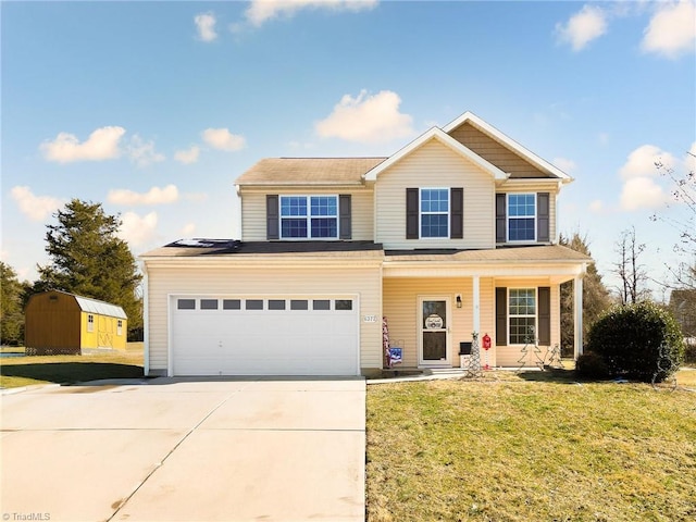 view of front of home featuring a garage, covered porch, and a front lawn