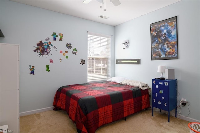 carpeted bedroom with ceiling fan