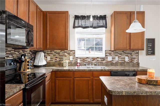 kitchen with sink, decorative backsplash, black appliances, and hanging light fixtures