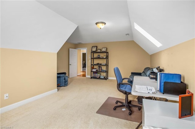home office with carpet flooring, baseboards, visible vents, and lofted ceiling with skylight